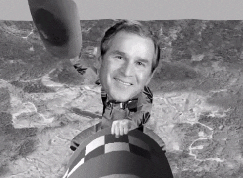 a black and white photo of george bush 's head on a rocket