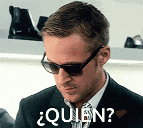 a man wearing sunglasses says " quien " in spanish