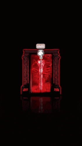 a red box with a light coming out of it in the dark