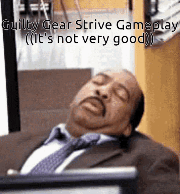 a man in a suit and tie is sleeping with the words guilty gear strive gameplay it 's not very good