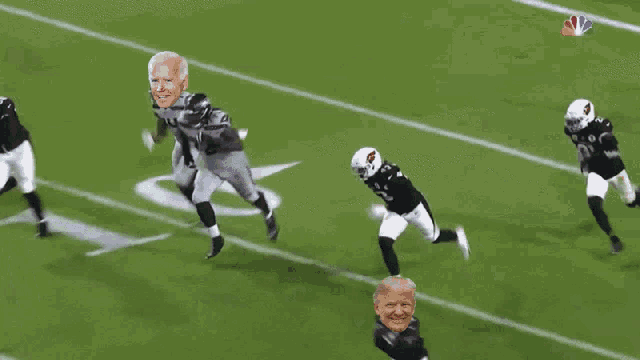 a football player with the number 32 on his jersey is running down the field
