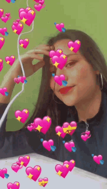 a girl with pink hearts around her face