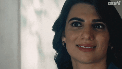 a close up of a woman 's face with the word genv in the corner