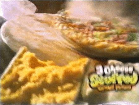 a close up of a pizza and a piece of cheese next to a box that says ' ruffles '