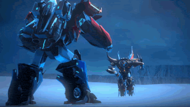 two robots are standing next to each other in the dark