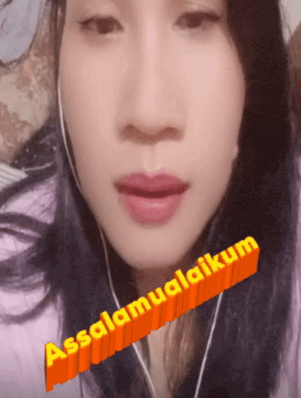 a close up of a woman 's face with the words assalamualaikum on the bottom right