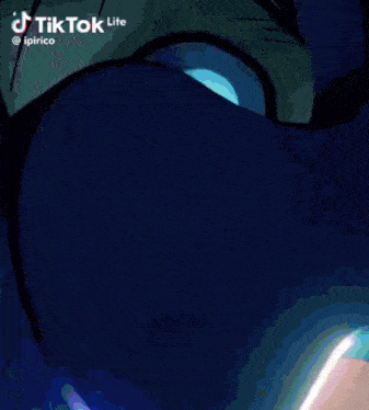 a close up of a person 's face with a tik tok lite watermark