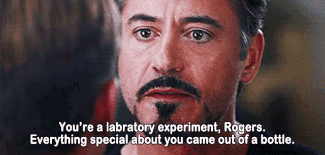 a close up of a man 's face with a caption that says " you 're a laboratory experiment rogers "