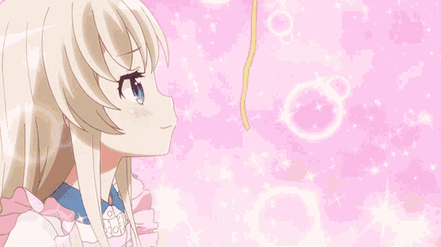 a close up of a girl eating something with a spoon in her mouth
