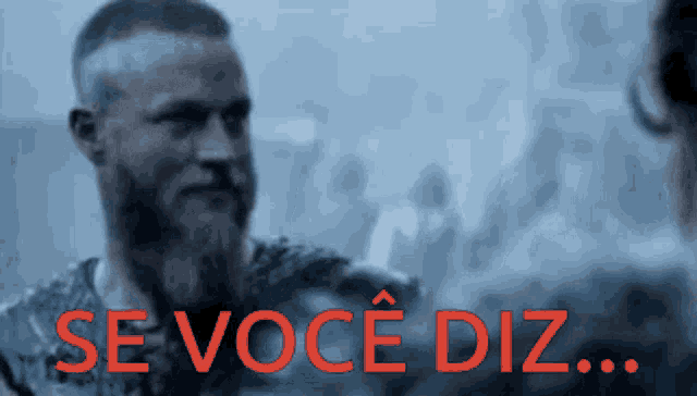a man with a beard and the words se voce diz in red