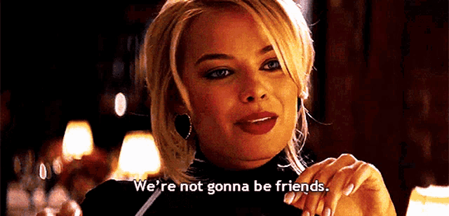a woman says " we 're not gonna be friends " in a dark room