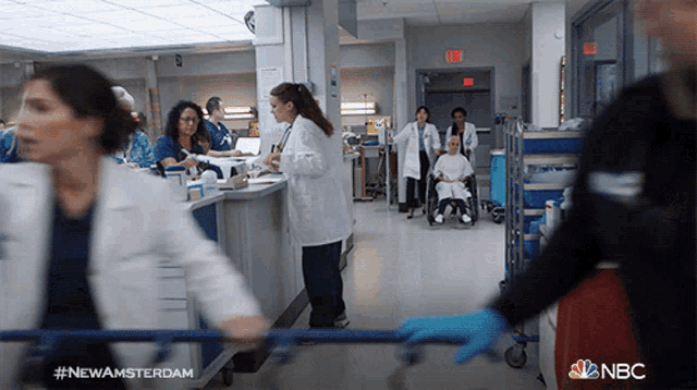 a nbc advertisement shows a hospital scene with a patient in a wheelchair