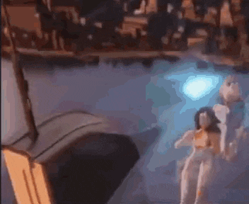a statue of a woman in a bikini is standing in front of a projector screen .