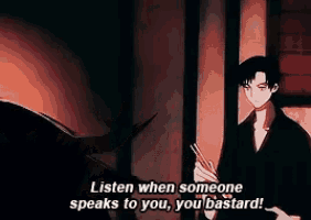 a man in a black suit says listen when someone speaks to you you bastard ..