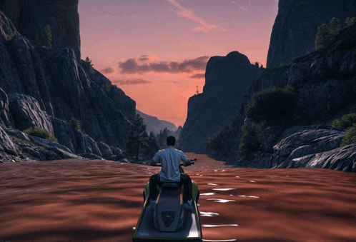 a man is riding a jet ski down a river at sunset