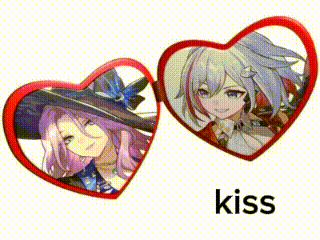 a couple of heart shaped mirrors with a picture of two anime girls on them .