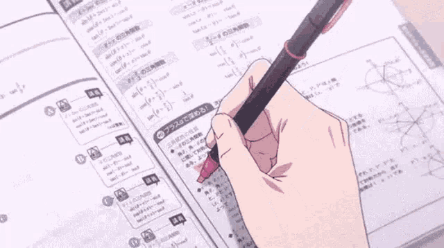 a hand is holding a pen over a page that says a on it