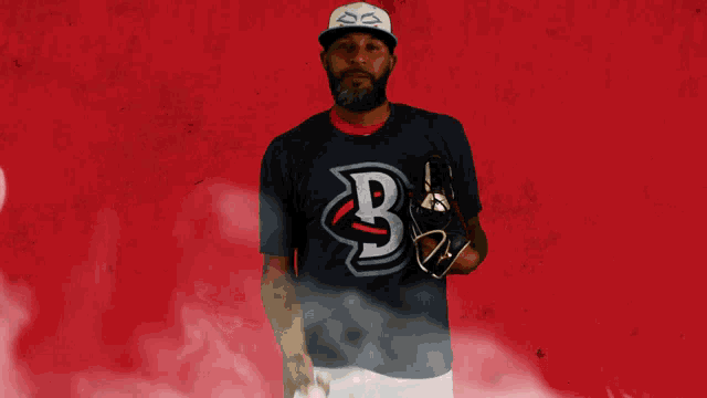 a baseball player with the letter b on his jersey