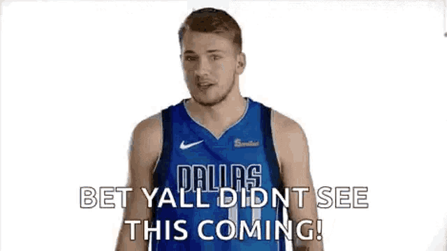 a basketball player is standing in front of a white background and making a funny face .