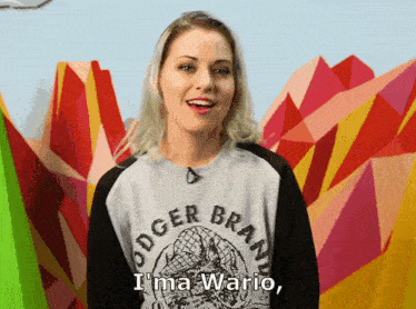 a woman wearing a dodger brand sweater says " i 'm a wario "