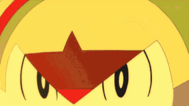 a close up of a cartoon character with a red star on its head