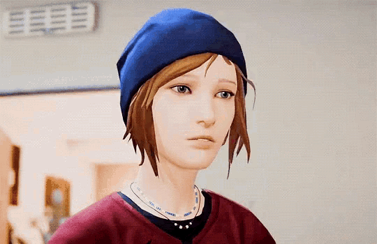 a woman wearing a blue hat and a red shirt