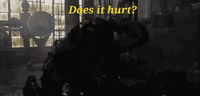 a man laying on the floor with the words " does it hurt " on the bottom