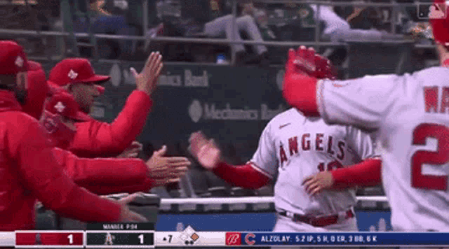 a baseball player with the number 2 on his back