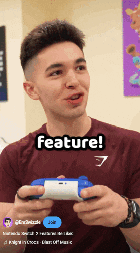 a man holding a video game controller with the words feature on the top