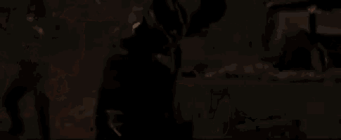 a close up of a person 's face in the dark .