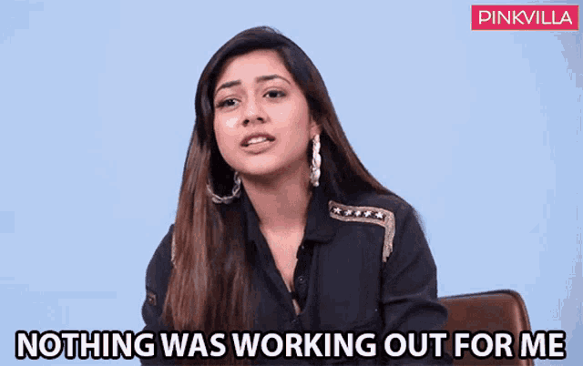 a woman says nothing was working out for me while sitting in a chair