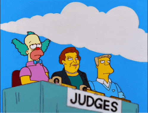 three cartoon characters sit behind a sign that says " judges "