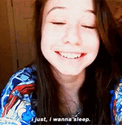 a girl is smiling and says i just i wanna sleep