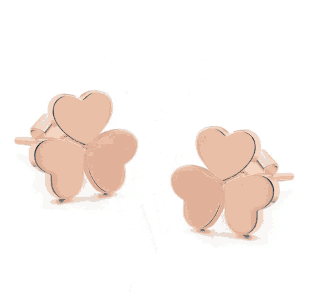 a silver ring with a flower shaped design and a diamond in the center