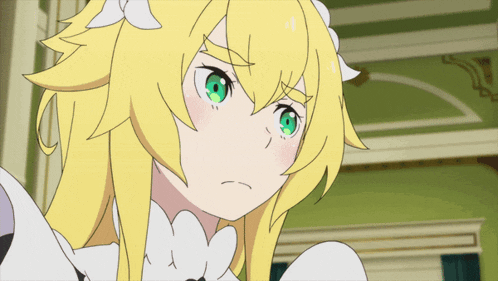 a girl with yellow hair and green eyes is looking at the camera