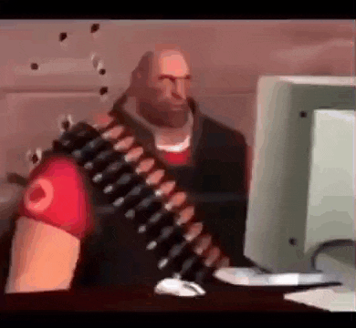 a cartoon character is sitting at a desk in front of a computer .