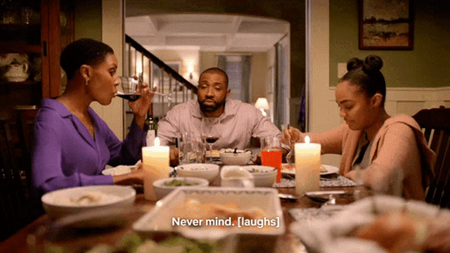a family sits at a dinner table with a caption that says " never mind laughs "