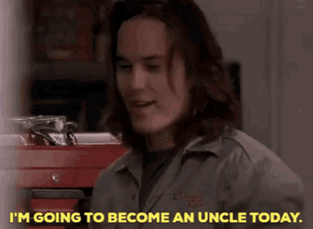 a man with long hair is talking about becoming an uncle