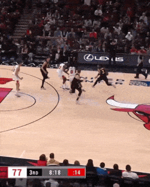 a basketball game is being played with the score 77 to 3rd