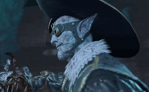a man with a hat and goggles holds a gun