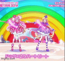 two anime girls are dancing in front of a rainbow .