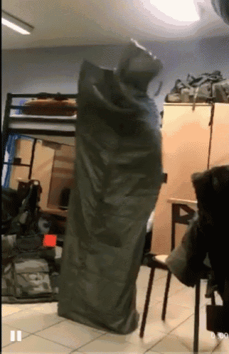 a video of a person wrapped in a blanket is being played
