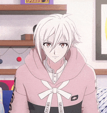 a girl with white hair is wearing a pink hoodie with the word trickstar on it