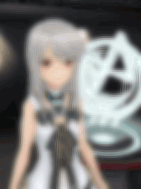 a blurry picture of a girl with a white dress