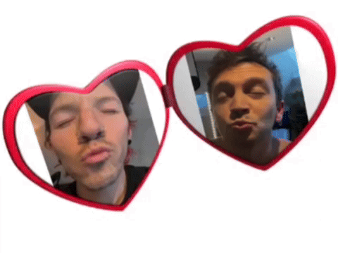 two heart shaped mirrors with a man making a face