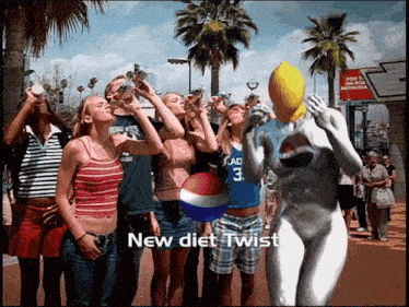 a group of people drinking pepsi while a pepsi man holds a ball