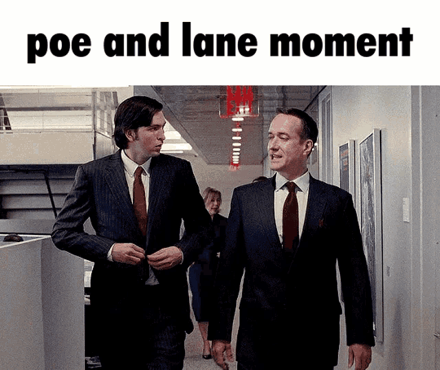 two men in suits and ties are walking down a hallway with the words poe and lane moment below them
