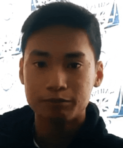 a close up of a young man 's face in front of a sailboat wallpaper