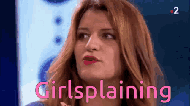 a close up of a woman 's face with the words girlsplaining in pink letters
