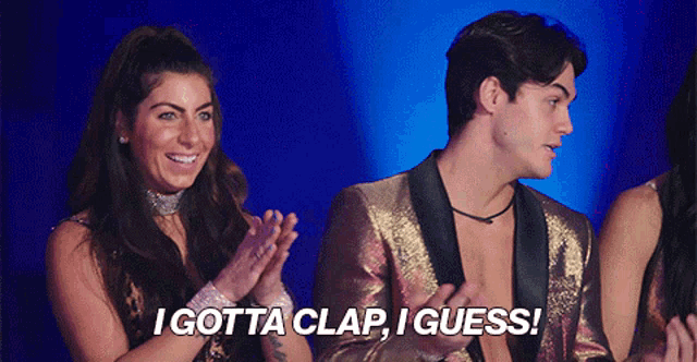 a man and a woman applauding with the words i gotta clap i guess